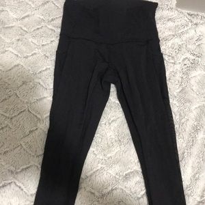 Lululemon black capris with mesh inserts